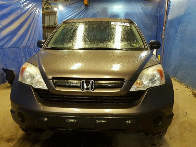 5J6RE48319L038664 - 2009 HONDA CR-V LX BROWN photo 9