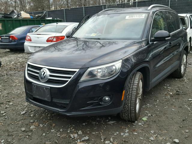 WVGBV7AX2BW565523 - 2011 VOLKSWAGEN TIGUAN S BLACK photo 2