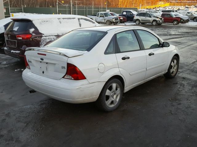 1FAHP38373W237428 - 2003 FORD FOCUS ZTS WHITE photo 4