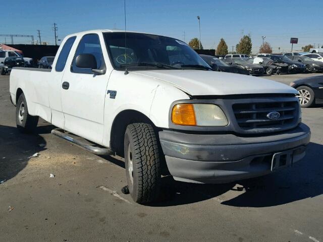 2FTRX17W04CA47580 - 2004 FORD F-150 HERI WHITE photo 1