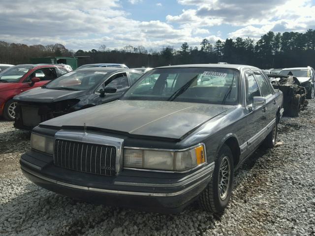 1LNLM81W3RY663219 - 1994 LINCOLN TOWN CAR E BLACK photo 2