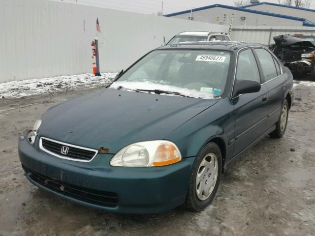 JHMEJ6572VS014102 - 1997 HONDA CIVIC LX GREEN photo 2