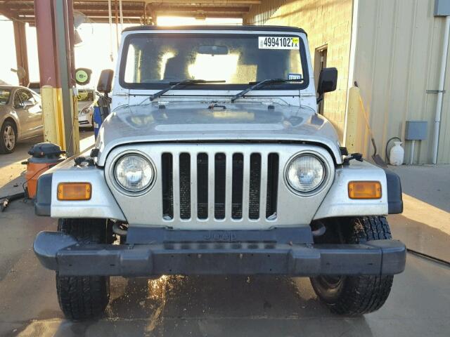 1J4F449S65P371165 - 2005 JEEP WRANGLER / SILVER photo 10