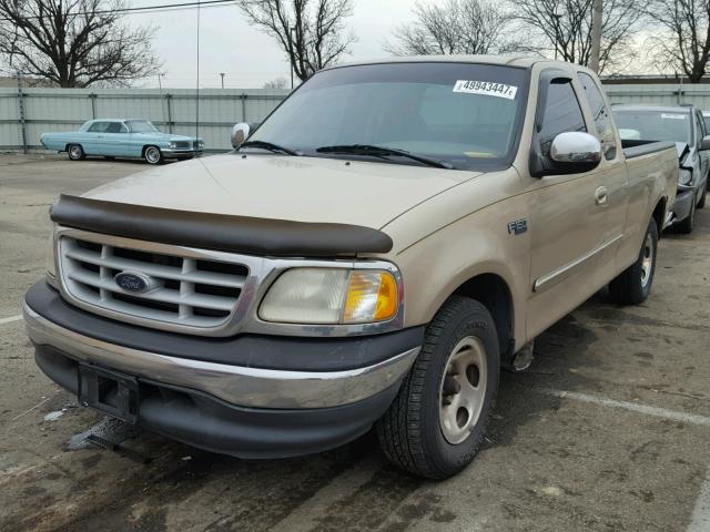 1FTZX1726XNA34814 - 1999 FORD F150 GOLD photo 2