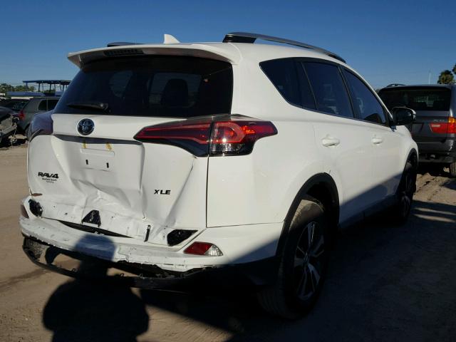 2T3WFREV1GW257773 - 2016 TOYOTA RAV4 XLE WHITE photo 4