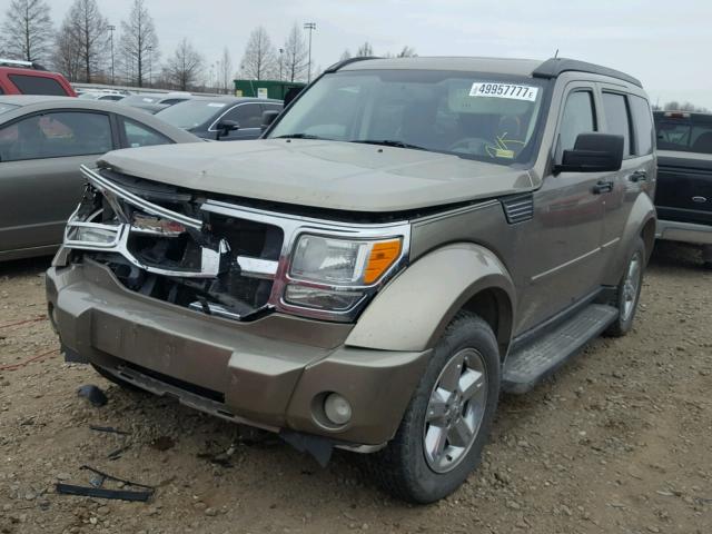 1D8GU58K37W555457 - 2007 DODGE NITRO SLT GOLD photo 2