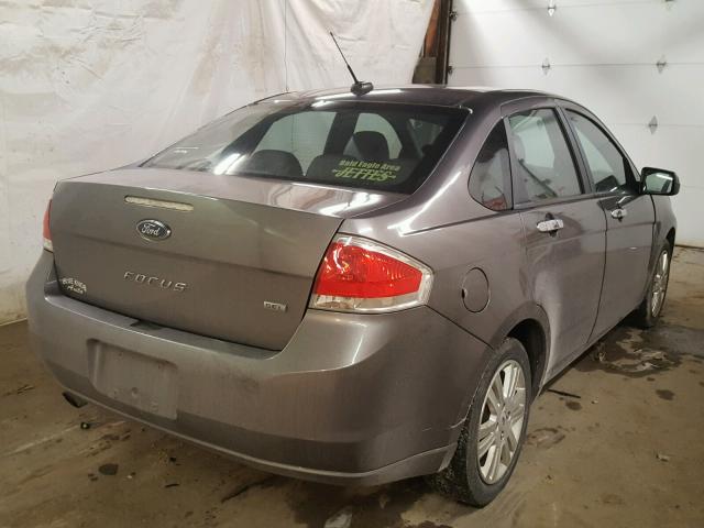 1FAHP3HN4AW264309 - 2010 FORD FOCUS SEL GRAY photo 4