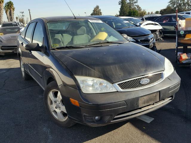 1FAHP34N16W132962 - 2006 FORD FOCUS ZX4 BLACK photo 1