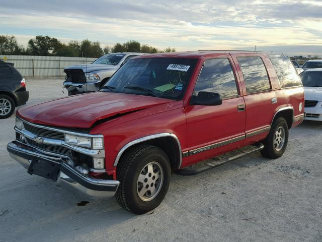 1GNEC13R4XJ379206 - 1999 CHEVROLET TAHOE C150 RED photo 2