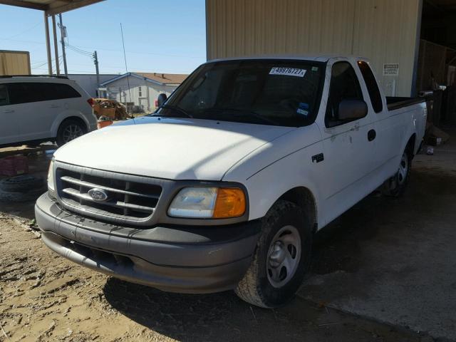 2FTRX172X4CA19136 - 2004 FORD F-150 HERI WHITE photo 2