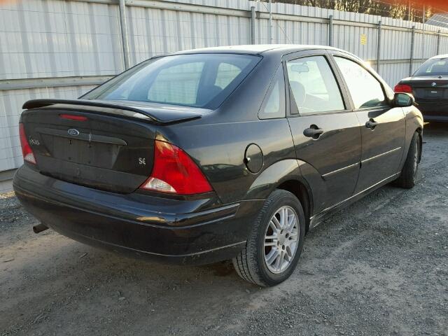 1FAFP34351W322312 - 2001 FORD FOCUS SE BLACK photo 4