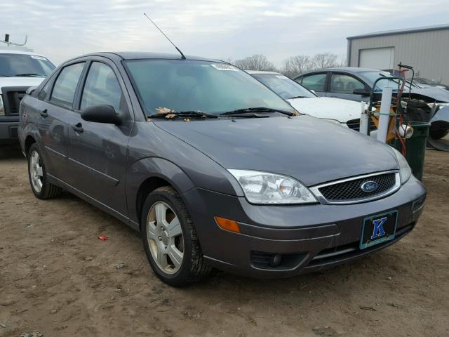 1FAHP34N67W234856 - 2007 FORD FOCUS ZX4 GRAY photo 1