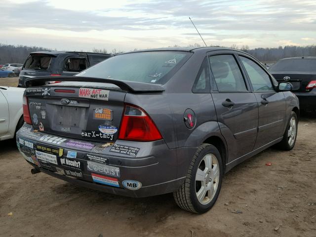 1FAHP34N67W234856 - 2007 FORD FOCUS ZX4 GRAY photo 4