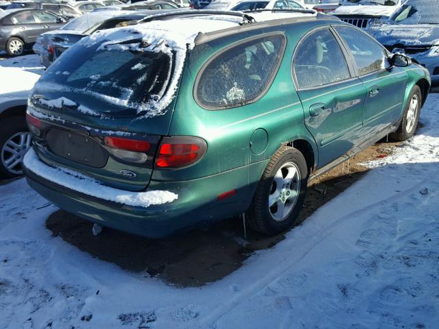 1FAFP5823YG186795 - 2000 FORD TAURUS SE GREEN photo 4