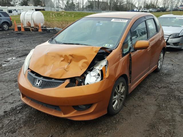 JHMGE88499S014355 - 2009 HONDA FIT SPORT ORANGE photo 2