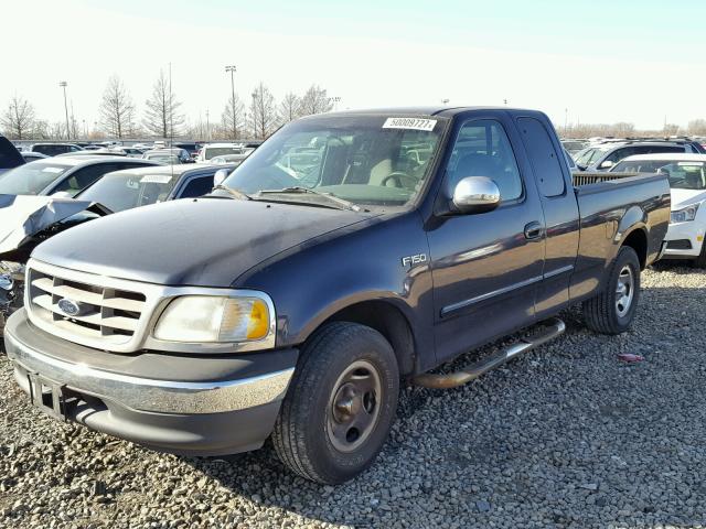 1FTZX1721YKA17776 - 2000 FORD F150 BLUE photo 2