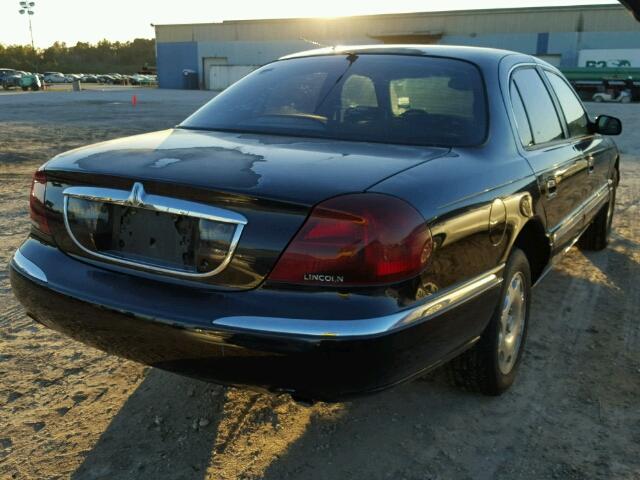 1LNFM97V2WY620763 - 1998 LINCOLN CONTINENTA BLACK photo 4