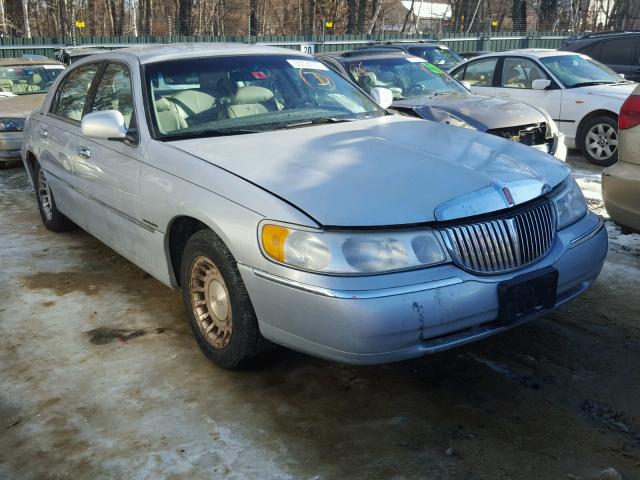 1LNHM81W9YY935356 - 2000 LINCOLN TOWN CAR E SILVER photo 1