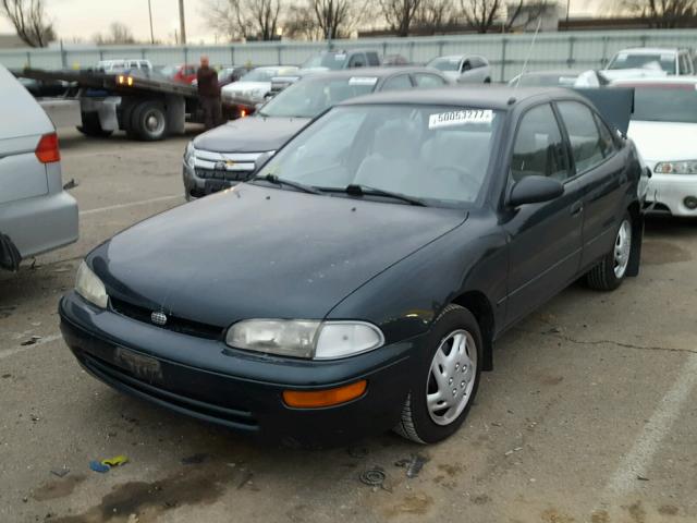 1Y1SK5265VZ423561 - 1997 GEO PRIZM BASE GREEN photo 2