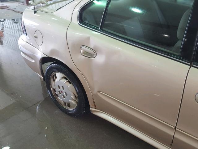 1G2NE52E75M217854 - 2005 PONTIAC GRAND AM S GOLD photo 9