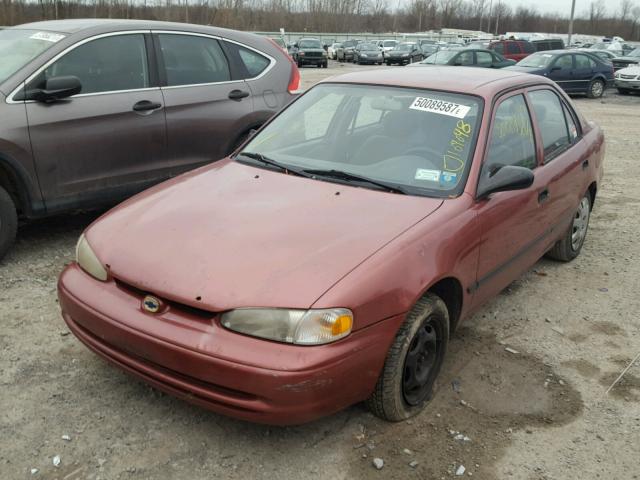 1Y1SK5287XZ433836 - 1999 CHEVROLET GEO PRIZM RED photo 2