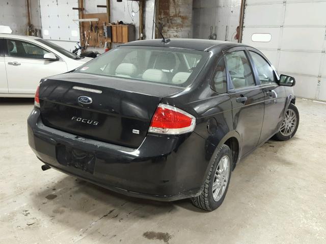 1FAHP3FN7BW124338 - 2011 FORD FOCUS SE BLACK photo 4