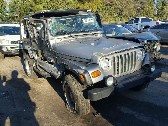 1J4FA49S02P701080 - 2002 JEEP WRANGLER / SILVER photo 1