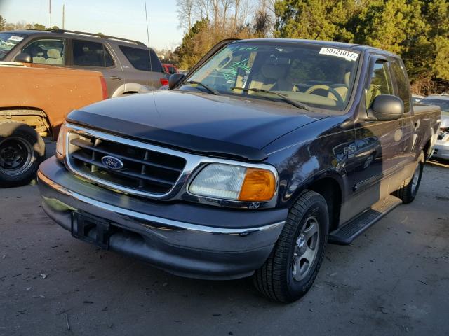 2FTRX17W24CA39755 - 2004 FORD F-150 HERI BLUE photo 2