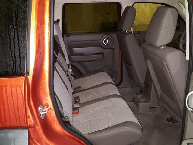 1D8GU28K07W569539 - 2007 DODGE NITRO SXT ORANGE photo 6