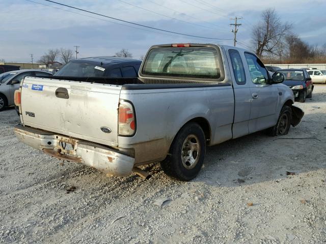 1FTZX1720YNB73404 - 2000 FORD F150 SILVER photo 4