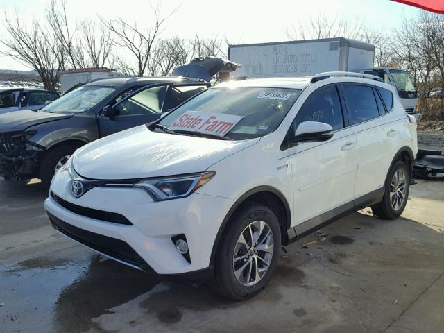 JTMRJREV9GD015211 - 2016 TOYOTA RAV4 HV XL WHITE photo 2