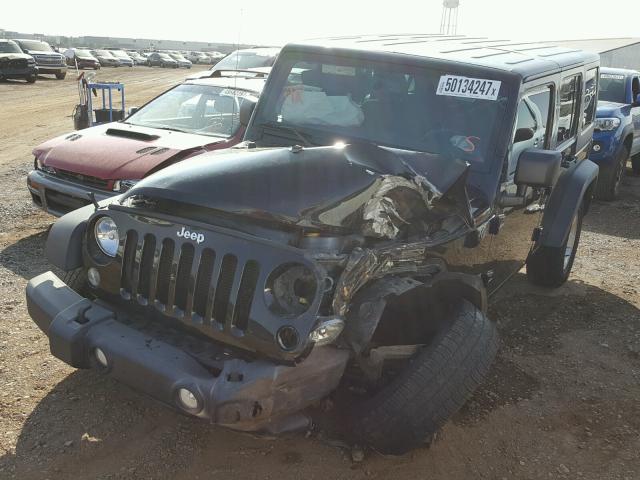 1C4HJWDG4EL121534 - 2014 JEEP WRANGLER U BLACK photo 2