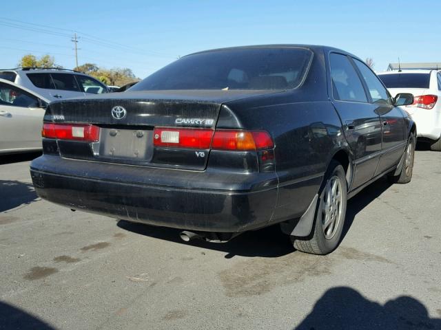 JT2BF22K3X0175900 - 1999 TOYOTA CAMRY LE BLACK photo 4