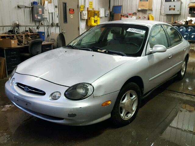 1FAFP53U9XG257313 - 1999 FORD TAURUS SE SILVER photo 2