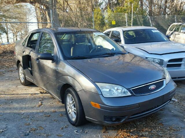 1FAHP34N86W213067 - 2006 FORD FOCUS ZX4 GRAY photo 1