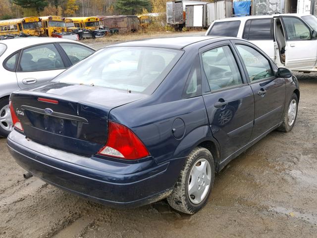 1FAFP33Z94W200207 - 2004 FORD FOCUS LX BLUE photo 4