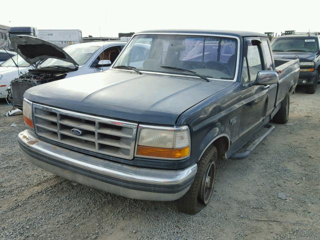 1FTEX15H7SKC10690 - 1995 FORD F150 GREEN photo 2