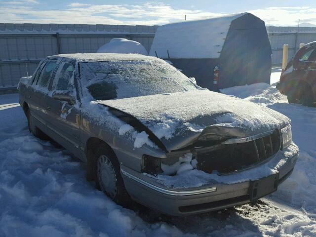 1G6KD54YXXU719546 - 1999 CADILLAC DEVILLE SILVER photo 1