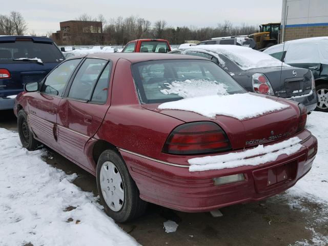 1G2NE543XPM620824 - 1993 PONTIAC GRAND AM S RED photo 3