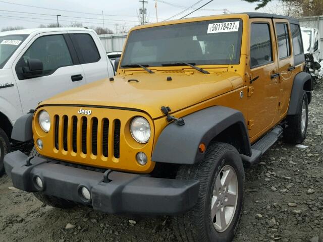 1C4HJWDG7EL232594 - 2014 JEEP WRANGLER U ORANGE photo 2