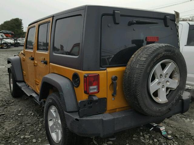 1C4HJWDG7EL232594 - 2014 JEEP WRANGLER U ORANGE photo 3