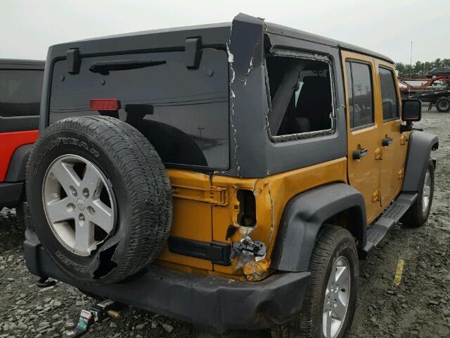 1C4HJWDG7EL232594 - 2014 JEEP WRANGLER U ORANGE photo 4