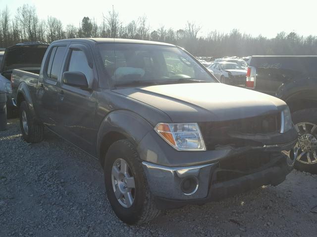 1N6AD09U07C457718 - 2007 NISSAN FRONTIER C GRAY photo 1