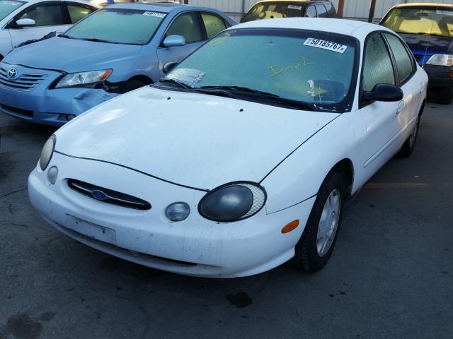 1FAFP52U5XG226545 - 1999 FORD TAURUS LX WHITE photo 2