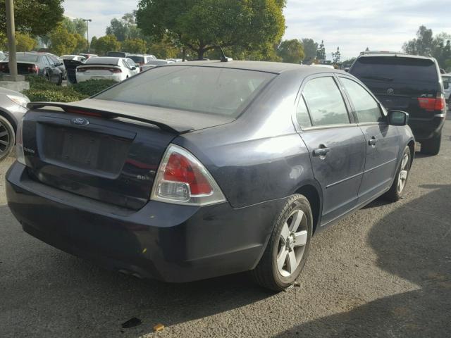 3FAHP07Z59R197110 - 2009 FORD FUSION SE BLUE photo 4