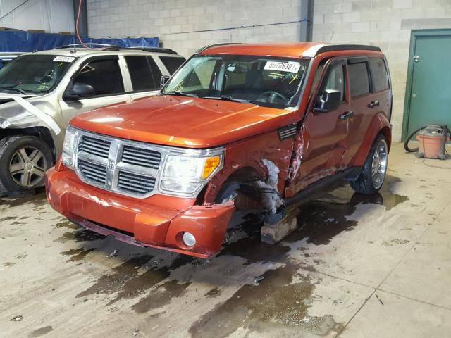 1D8GU58K97W555544 - 2007 DODGE NITRO SLT ORANGE photo 2