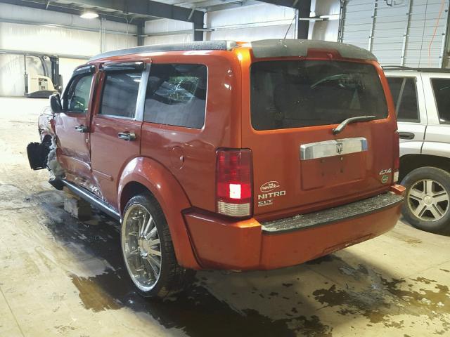 1D8GU58K97W555544 - 2007 DODGE NITRO SLT ORANGE photo 3