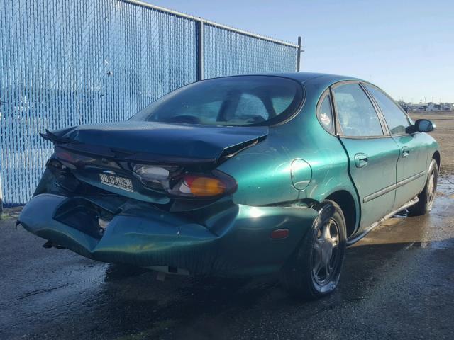 1FALP52UXVA295573 - 1997 FORD TAURUS GL GREEN photo 4