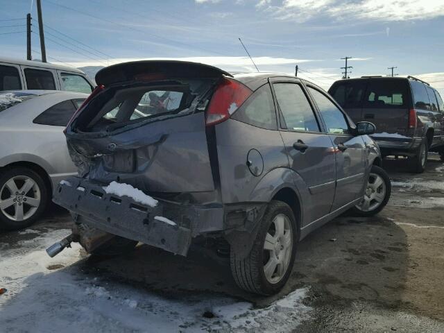 1FAHP37N67W113448 - 2007 FORD FOCUS ZX5 GRAY photo 4