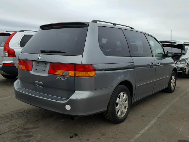 2HKRL186X2H544055 - 2002 HONDA ODYSSEY EX GRAY photo 4